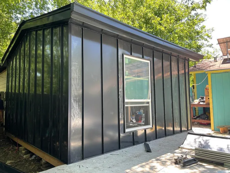 Black standing seam metal wall panels for Roof Inspection in Kendall