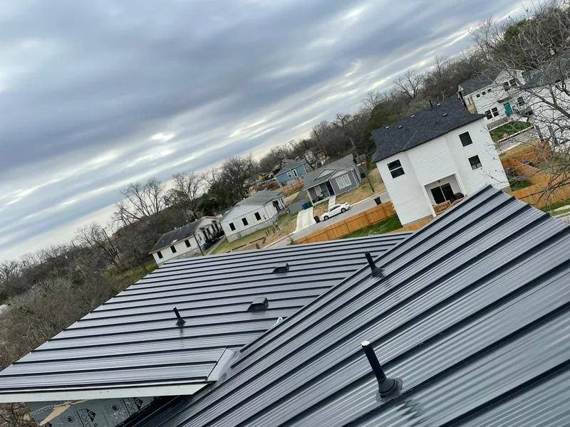 Standing seam metal roof panels with vents for Skylight Repair in Kendall